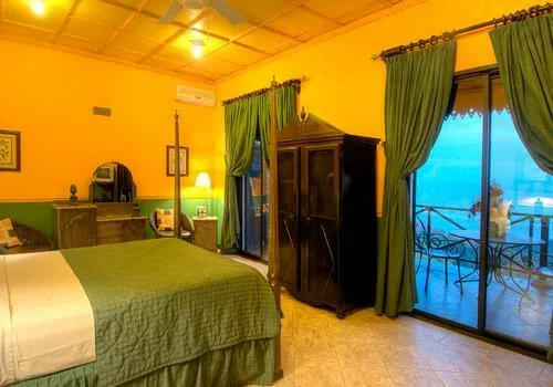 Une chambre a l'hotel Villa Caletas. Voyage sur mesure avec une agence locale francophone au costa rica